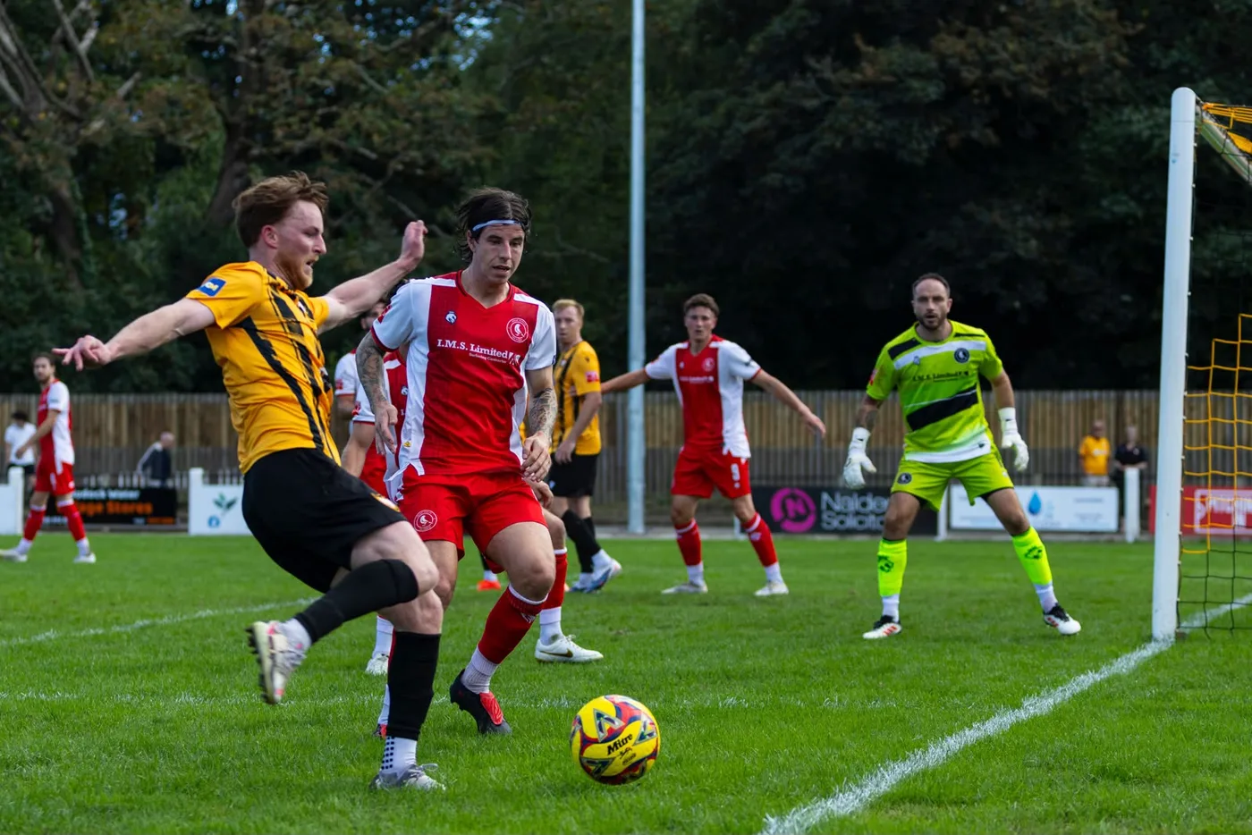 Luke Barner crossing the ball for Falmouth Town